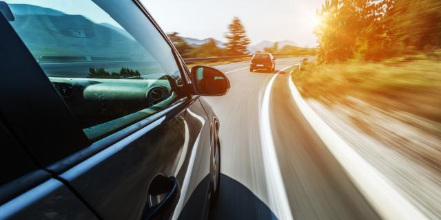 image of cars in road