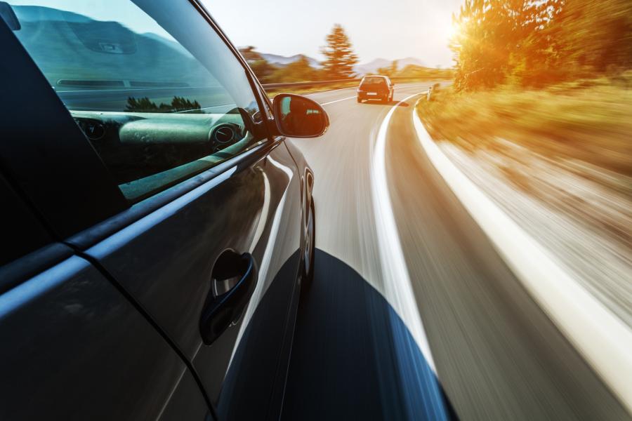 image of cars in road